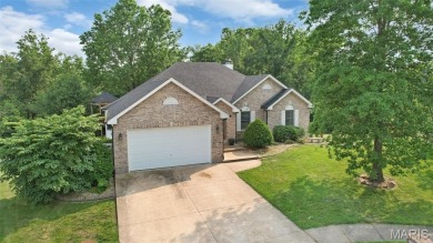 This beautifully designed atrium ranch offers the perfect blend on Bear Creek Golf Club in Missouri - for sale on GolfHomes.com, golf home, golf lot