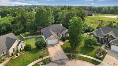 This beautifully designed atrium ranch offers the perfect blend on Bear Creek Golf Club in Missouri - for sale on GolfHomes.com, golf home, golf lot