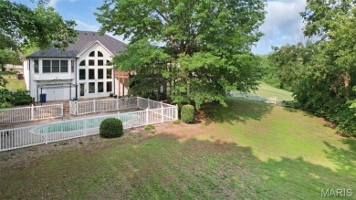 This beautifully designed atrium ranch offers the perfect blend on Bear Creek Golf Club in Missouri - for sale on GolfHomes.com, golf home, golf lot