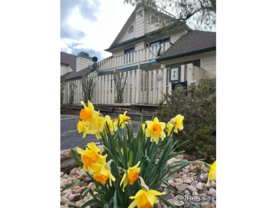 Looking for an immaculately maintained, main-level condo? Look on Estes Park Golf Course in Colorado - for sale on GolfHomes.com, golf home, golf lot