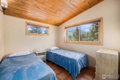 Charming cabin near Estes Park's 18 Hole Golf Course! Two on Estes Park Golf Course in Colorado - for sale on GolfHomes.com, golf home, golf lot