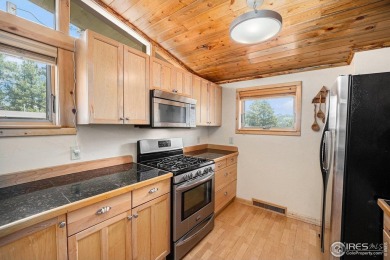 Charming cabin near Estes Park's 18 Hole Golf Course! Two on Estes Park Golf Course in Colorado - for sale on GolfHomes.com, golf home, golf lot