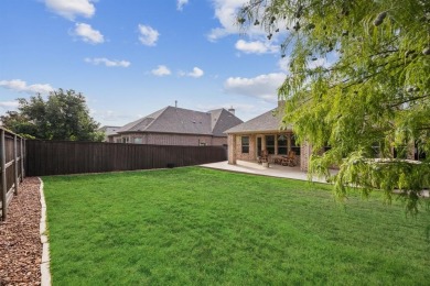 This meticulously maintained two-story residence is just steps on The Tribute At the Colony in Texas - for sale on GolfHomes.com, golf home, golf lot