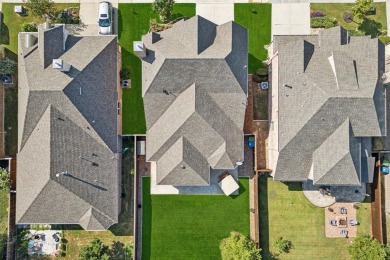 This meticulously maintained two-story residence is just steps on The Tribute At the Colony in Texas - for sale on GolfHomes.com, golf home, golf lot