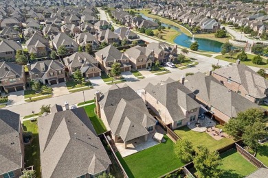 This meticulously maintained two-story residence is just steps on The Tribute At the Colony in Texas - for sale on GolfHomes.com, golf home, golf lot