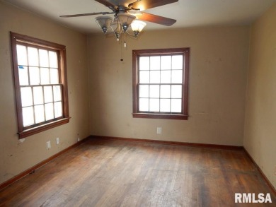 Situated across from Bunn Golf Course and Bunn Park, this 1.5 on Bunn Golf Course in Illinois - for sale on GolfHomes.com, golf home, golf lot