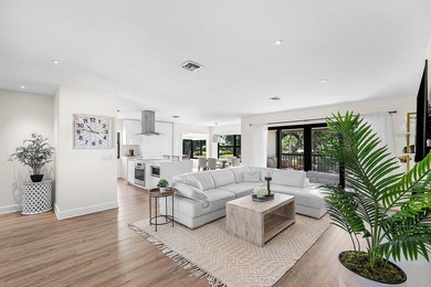 Experience resort-style living in this beautifully renovated on Quail Ridge Golf Course and Country Club in Florida - for sale on GolfHomes.com, golf home, golf lot