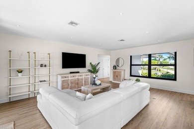 Experience resort-style living in this beautifully renovated on Quail Ridge Golf Course and Country Club in Florida - for sale on GolfHomes.com, golf home, golf lot