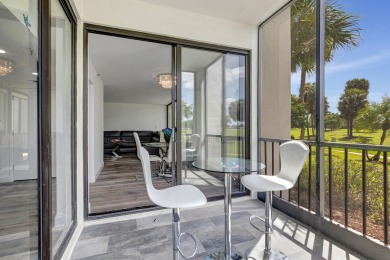 SELLER will credit BUYER $10,000 at closing towards flooring on Boca West Golf and Country Club in Florida - for sale on GolfHomes.com, golf home, golf lot