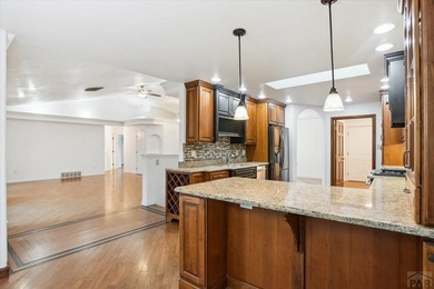 Wake up to wide-open fairway views and the relaxed rhythm of on Desert Hawk At Pueblo West in Colorado - for sale on GolfHomes.com, golf home, golf lot