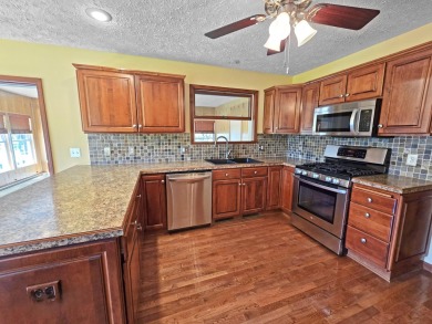 Welcome to this beautiful home on the 12th fairway of the on Gaylord Country Club in Michigan - for sale on GolfHomes.com, golf home, golf lot