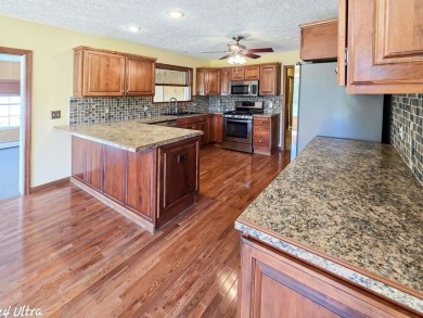 Welcome to this beautiful home on the 12th fairway of the on Gaylord Country Club in Michigan - for sale on GolfHomes.com, golf home, golf lot