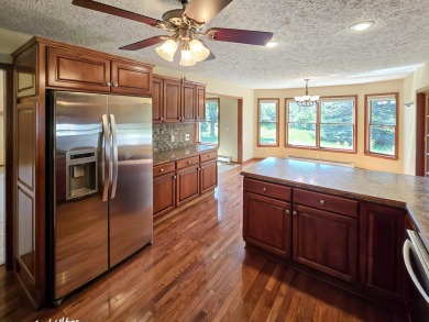 Welcome to this beautiful home on the 12th fairway of the on Gaylord Country Club in Michigan - for sale on GolfHomes.com, golf home, golf lot