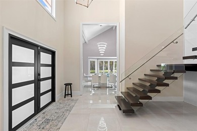 Nestled within the prestigious Wellington Aero Club on a quiet on The Wanderers Club in Florida - for sale on GolfHomes.com, golf home, golf lot