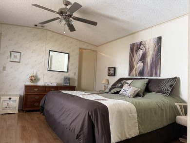 Welcome to your slice of paradise in the vibrant, 55+ Spanish on Spanish Lakes Fairways in Florida - for sale on GolfHomes.com, golf home, golf lot