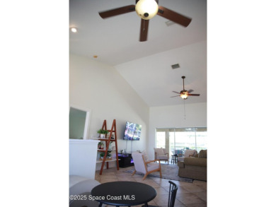 Beautifully maintained 3-bedroom, 2-bathroom pool home located on Suntree Country Club in Florida - for sale on GolfHomes.com, golf home, golf lot