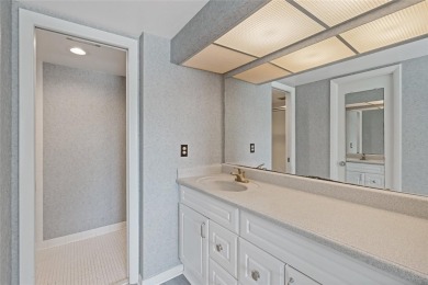 This bright and cheerful 2/2 Cove Cay gem is priced to sell! on Cove Cay Country Club in Florida - for sale on GolfHomes.com, golf home, golf lot