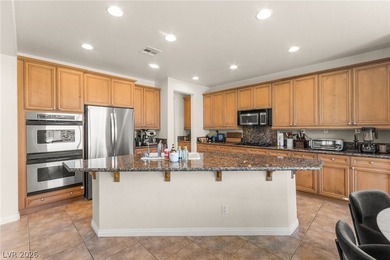 Located in the prestigious Seven Hills community, this elegant on Rio Secco Golf Club in Nevada - for sale on GolfHomes.com, golf home, golf lot