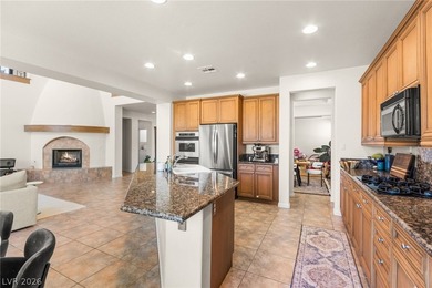 Located in the prestigious Seven Hills community, this elegant on Rio Secco Golf Club in Nevada - for sale on GolfHomes.com, golf home, golf lot