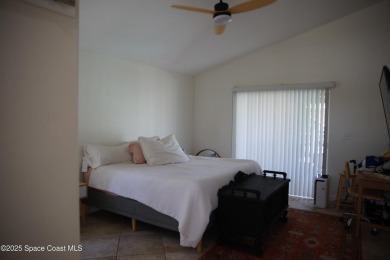 Beautifully maintained 3-bedroom, 2-bathroom pool home located on Suntree Country Club in Florida - for sale on GolfHomes.com, golf home, golf lot