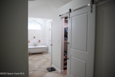 Beautifully maintained 3-bedroom, 2-bathroom pool home located on Suntree Country Club in Florida - for sale on GolfHomes.com, golf home, golf lot