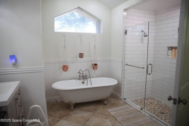 Beautifully maintained 3-bedroom, 2-bathroom pool home located on Suntree Country Club in Florida - for sale on GolfHomes.com, golf home, golf lot