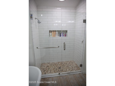 Beautifully maintained 3-bedroom, 2-bathroom pool home located on Suntree Country Club in Florida - for sale on GolfHomes.com, golf home, golf lot