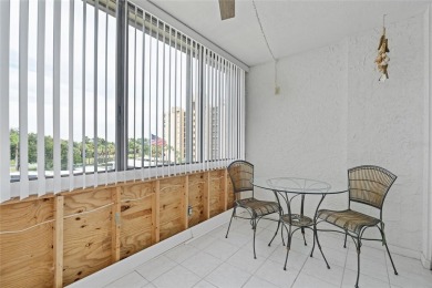 This bright and cheerful 2/2 Cove Cay gem is priced to sell! on Cove Cay Country Club in Florida - for sale on GolfHomes.com, golf home, golf lot
