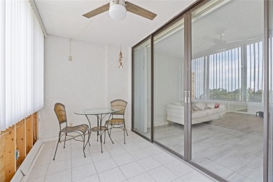 This bright and cheerful 2/2 Cove Cay gem is priced to sell! on Cove Cay Country Club in Florida - for sale on GolfHomes.com, golf home, golf lot