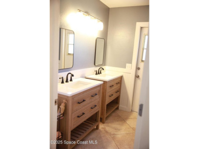 Beautifully maintained 3-bedroom, 2-bathroom pool home located on Suntree Country Club in Florida - for sale on GolfHomes.com, golf home, golf lot