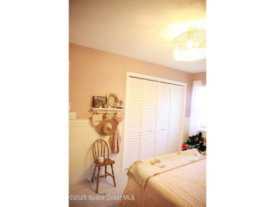 Beautifully maintained 3-bedroom, 2-bathroom pool home located on Suntree Country Club in Florida - for sale on GolfHomes.com, golf home, golf lot
