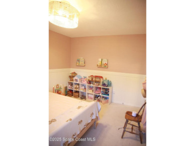 Beautifully maintained 3-bedroom, 2-bathroom pool home located on Suntree Country Club in Florida - for sale on GolfHomes.com, golf home, golf lot