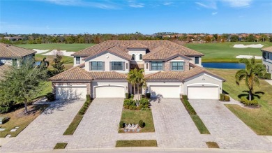 Welcome to this RARELY AVAILABLE OPEN FLOORPLAN upstairs coach on Lakewood National Golf Club in Florida - for sale on GolfHomes.com, golf home, golf lot