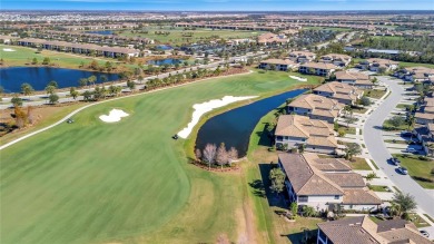 Welcome to this RARELY AVAILABLE OPEN FLOORPLAN upstairs coach on Lakewood National Golf Club in Florida - for sale on GolfHomes.com, golf home, golf lot