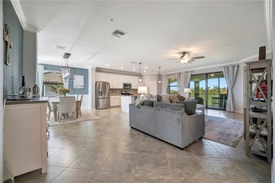 Welcome to this RARELY AVAILABLE OPEN FLOORPLAN upstairs coach on Lakewood National Golf Club in Florida - for sale on GolfHomes.com, golf home, golf lot