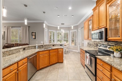 This stunning former builder's model home by Robinshore is on Haile Plantation Golf and Country Club in Florida - for sale on GolfHomes.com, golf home, golf lot