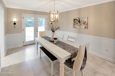 Move-in ready and beautifully updated, this 4-bedroom, 2-bath on Colonial Country Club Deerfield in Mississippi - for sale on GolfHomes.com, golf home, golf lot