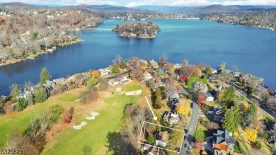 Discover the perfect blend of serene lake living and modern on Lake Mohawk Golf Club in New Jersey - for sale on GolfHomes.com, golf home, golf lot