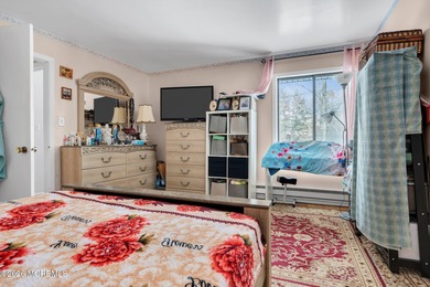 Welcome to this charming 2-bedroom, 1-bathroom condo in Covered on Pine Brook Golf Course in New Jersey - for sale on GolfHomes.com, golf home, golf lot