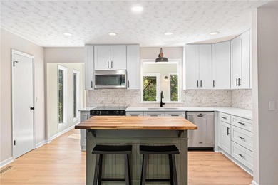 Welcome to this beautifully renovated cedar-sided Cape Cod on The Trail At Chickasaw Pointe in South Carolina - for sale on GolfHomes.com, golf home, golf lot