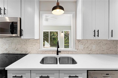 Welcome to this beautifully renovated cedar-sided Cape Cod on The Trail At Chickasaw Pointe in South Carolina - for sale on GolfHomes.com, golf home, golf lot