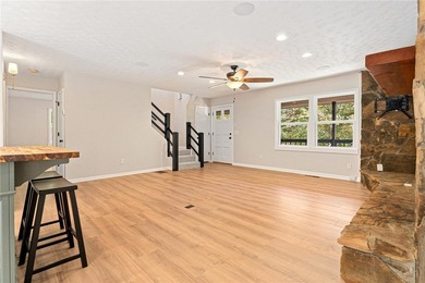 Welcome to this beautifully renovated cedar-sided Cape Cod on The Trail At Chickasaw Pointe in South Carolina - for sale on GolfHomes.com, golf home, golf lot