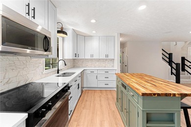 Welcome to this beautifully renovated cedar-sided Cape Cod on The Trail At Chickasaw Pointe in South Carolina - for sale on GolfHomes.com, golf home, golf lot