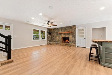 Welcome to this beautifully renovated cedar-sided Cape Cod on The Trail At Chickasaw Pointe in South Carolina - for sale on GolfHomes.com, golf home, golf lot