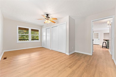Welcome to this beautifully renovated cedar-sided Cape Cod on The Trail At Chickasaw Pointe in South Carolina - for sale on GolfHomes.com, golf home, golf lot