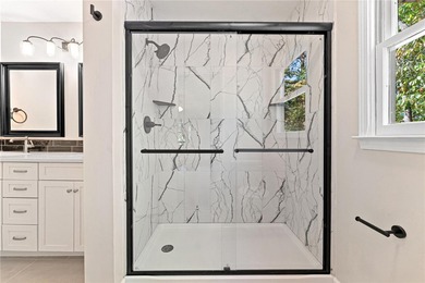 Welcome to this beautifully renovated cedar-sided Cape Cod on The Trail At Chickasaw Pointe in South Carolina - for sale on GolfHomes.com, golf home, golf lot