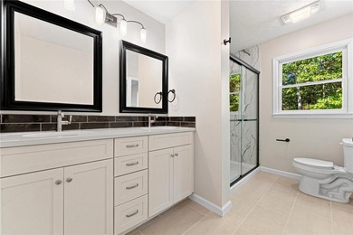 Welcome to this beautifully renovated cedar-sided Cape Cod on The Trail At Chickasaw Pointe in South Carolina - for sale on GolfHomes.com, golf home, golf lot