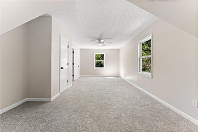 Welcome to this beautifully renovated cedar-sided Cape Cod on The Trail At Chickasaw Pointe in South Carolina - for sale on GolfHomes.com, golf home, golf lot