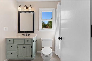 Welcome to this beautifully renovated cedar-sided Cape Cod on The Trail At Chickasaw Pointe in South Carolina - for sale on GolfHomes.com, golf home, golf lot