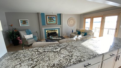 Rare opportunity to own a luxury lakefront home in the private on Lakes of the Four Seasons Country Club in Indiana - for sale on GolfHomes.com, golf home, golf lot